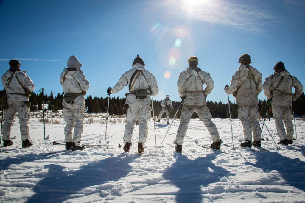 10th Special Forces Group (Airborne) Green Berets prepare for a class on how to shoot while wearing skis during cold weather training at Montana on Feb. 9, 2023. Being familiar with new equipment helps Soldiers be more confident in performing their tasks. (U.S. Army photo by Spc. Kimberly Gonzalez)