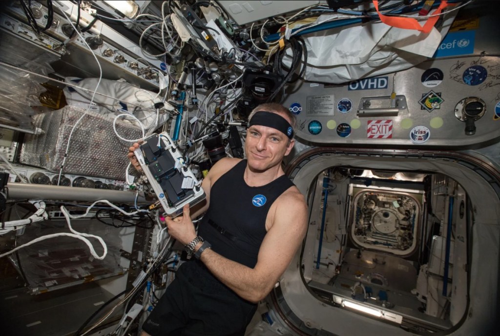 CSA astronaut David Saint-Jacques wears the Bio-Monitor health sensor shirt and headband. NASA