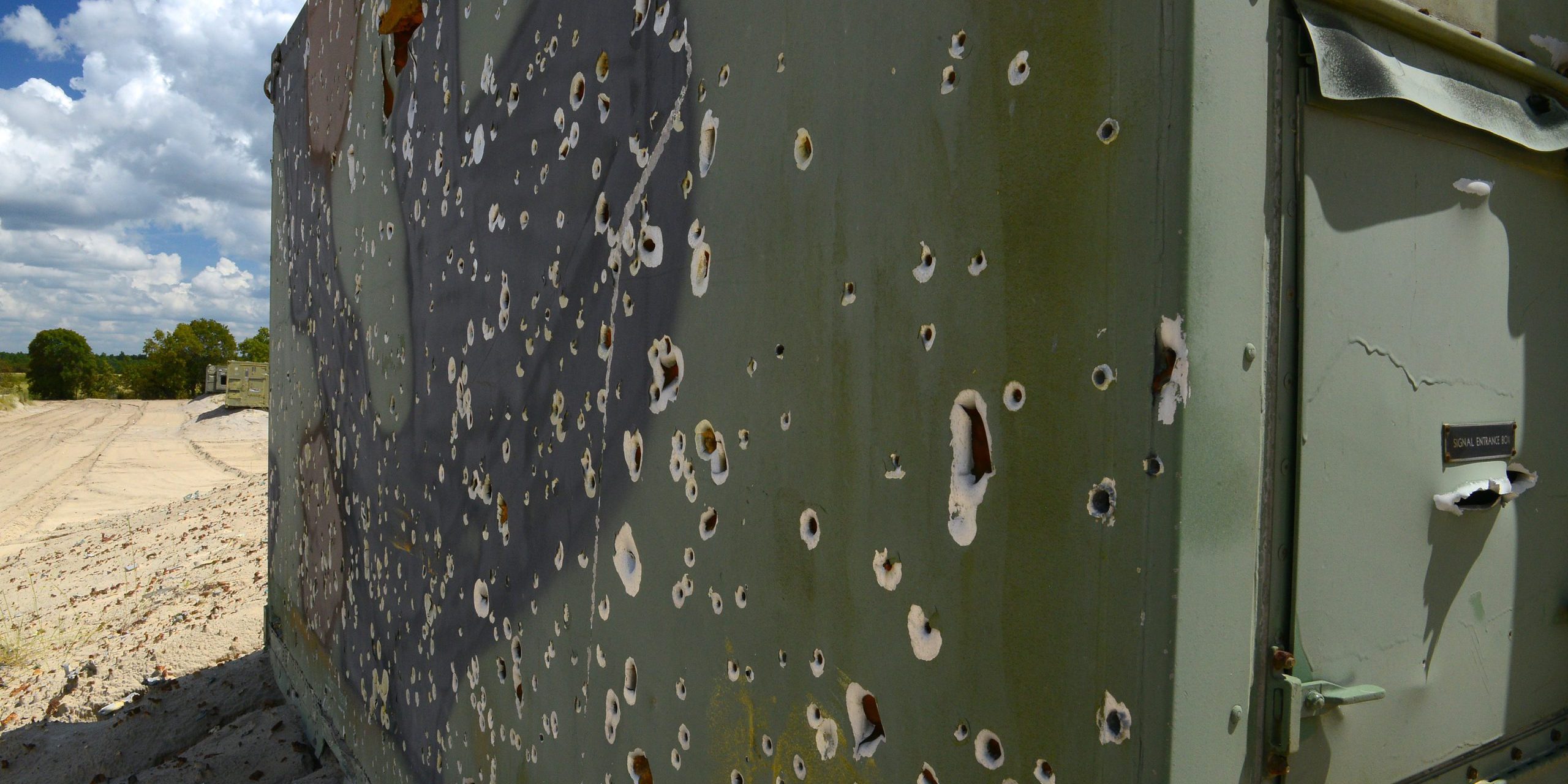 Targets are riddled with holes from aircraft target training missions at Poinsett Electronic Combat Range, Sumter, SC, on September 4, 2014. In 2013, there were 172,160 bullets shot at the range, including 20-mm, 7.62-mm, and .50-caliber bullets (U.S. Air Force photo by Airman 1st Class Diana M. Cossaboom/released).