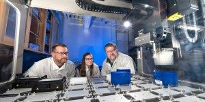 From left: chemists Brian Mayer and Katelyn Mason and biologist Todd Corzett observe the operation of the robot that independently executes the acetylchlolinersterase assays the team uses to assess Novichok inhibition and to discover new oxime antidotes for Novichok poisoning. (Photo: Blaise Douros/LLNL)