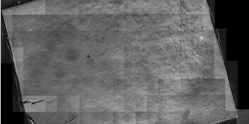 A palladium bar after being exposed to lasers in a low-energy nuclear reaction experiment at the U.S. Army Engineer Research and Development Center’s Cold Regions Research and Engineering Laboratory in Hanover, NH. The image shows areas of silicon that were not present before the experiment. The image was taken with a scanning electron microscope at about a 1-µm resolution. The palladium bar was about a centimeter squared in area (source: U.S. Army ERDC).