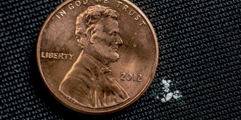 A photo illustrating 2 milligrams of fentanyl, a lethal dose for most people, compared to a penny. Matthew Moorman, a Sandia National Laboratories researcher, has developed a new method to detect tiny amounts of fentanyl analogs based on their common molecular structures. (Photo courtesy of the Drug Enforcement Administration)