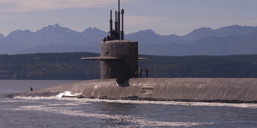 Puget Sound, Washington (October 15, 2017) - The Ohio-class ballistic-missile submarine USS Louisiana (SSBN 743) transits the Hood Canal as it returns to its homeport following a strategic deterrent patrol. Louisiana is one of eight ballistic-missile submarines stationed at Naval Base Kitsap-Bangor providing the most survivable leg of the strategic deterrence triad for the United States (U.S. Navy photo by Lt. Cmdr. Michael Smith/released).