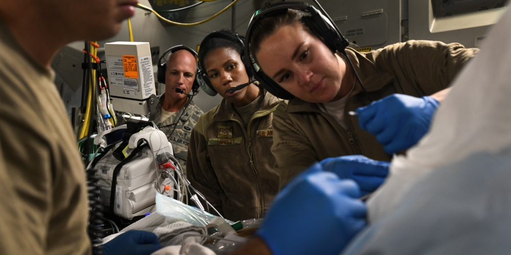 Medical Military Personnel performing training.