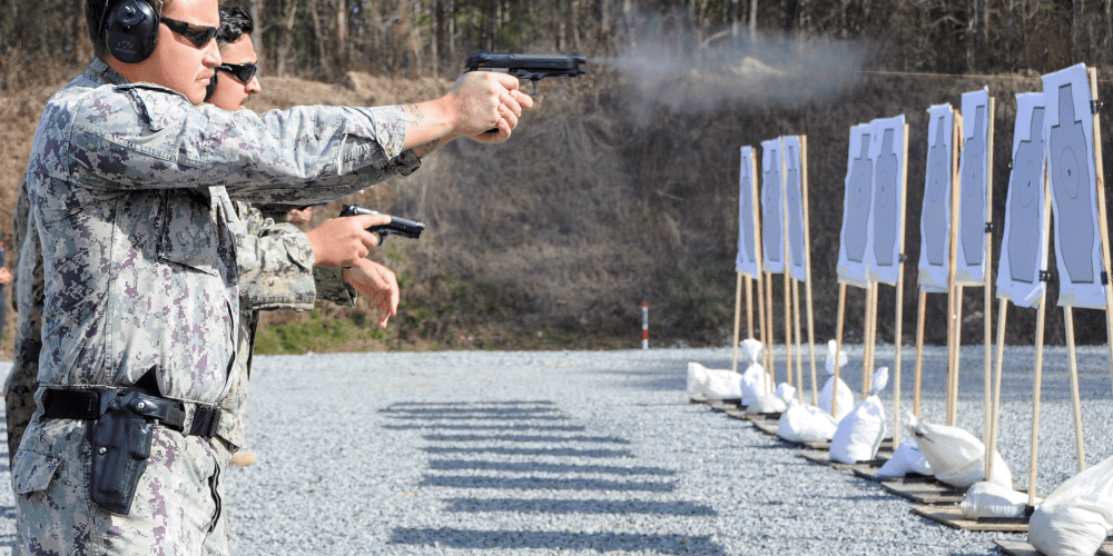 3 Military Personnel participating in firearms training